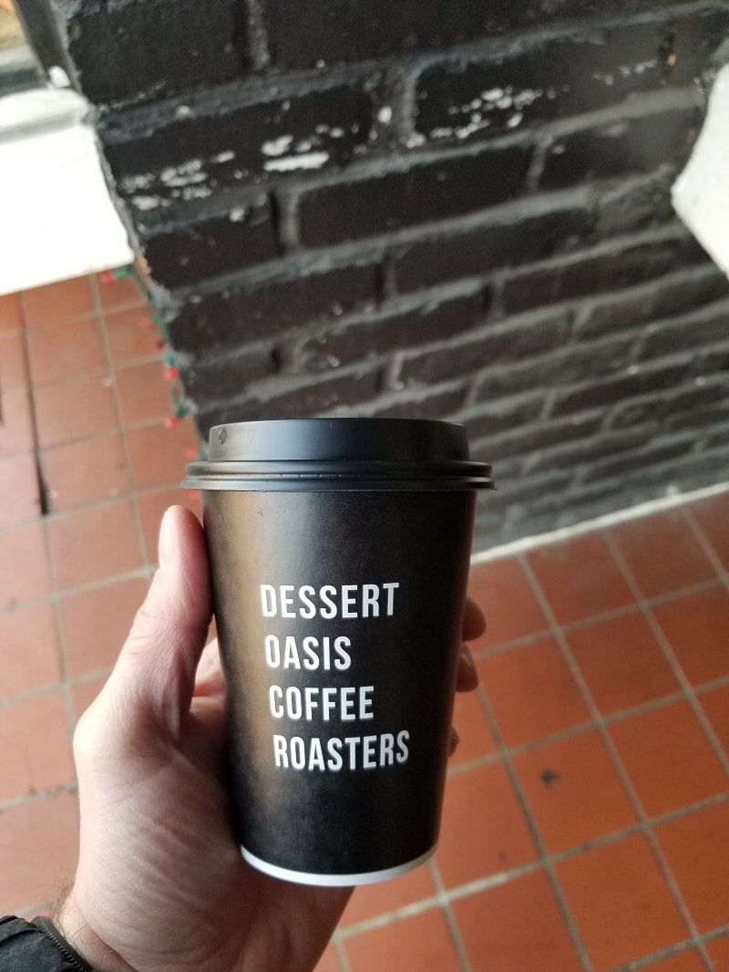 Dessert Oasis Coffee Roasters to-go coffee cup